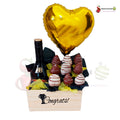 Caja kraf 9 fresas con chocolate y botella de Baileys globo de latex